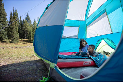 Coleman 50°F Sleeping Bag, Comfortable Youth Sleeping Bag for Sleepovers & Camping, Fits Children up to 5ft Tall, Glow in The Dark Design, Stuff Sack Included, Machine Washable