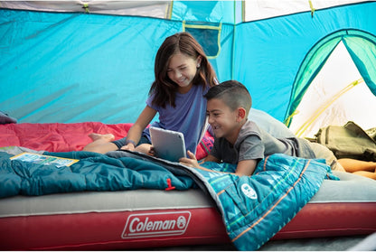 Coleman 50°F Sleeping Bag, Comfortable Youth Sleeping Bag for Sleepovers & Camping, Fits Children up to 5ft Tall, Glow in The Dark Design, Stuff Sack Included, Machine Washable
